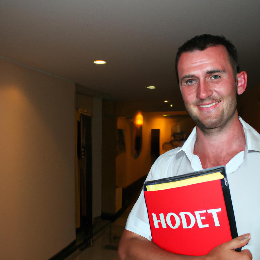 Man holding hotel directory, smiling